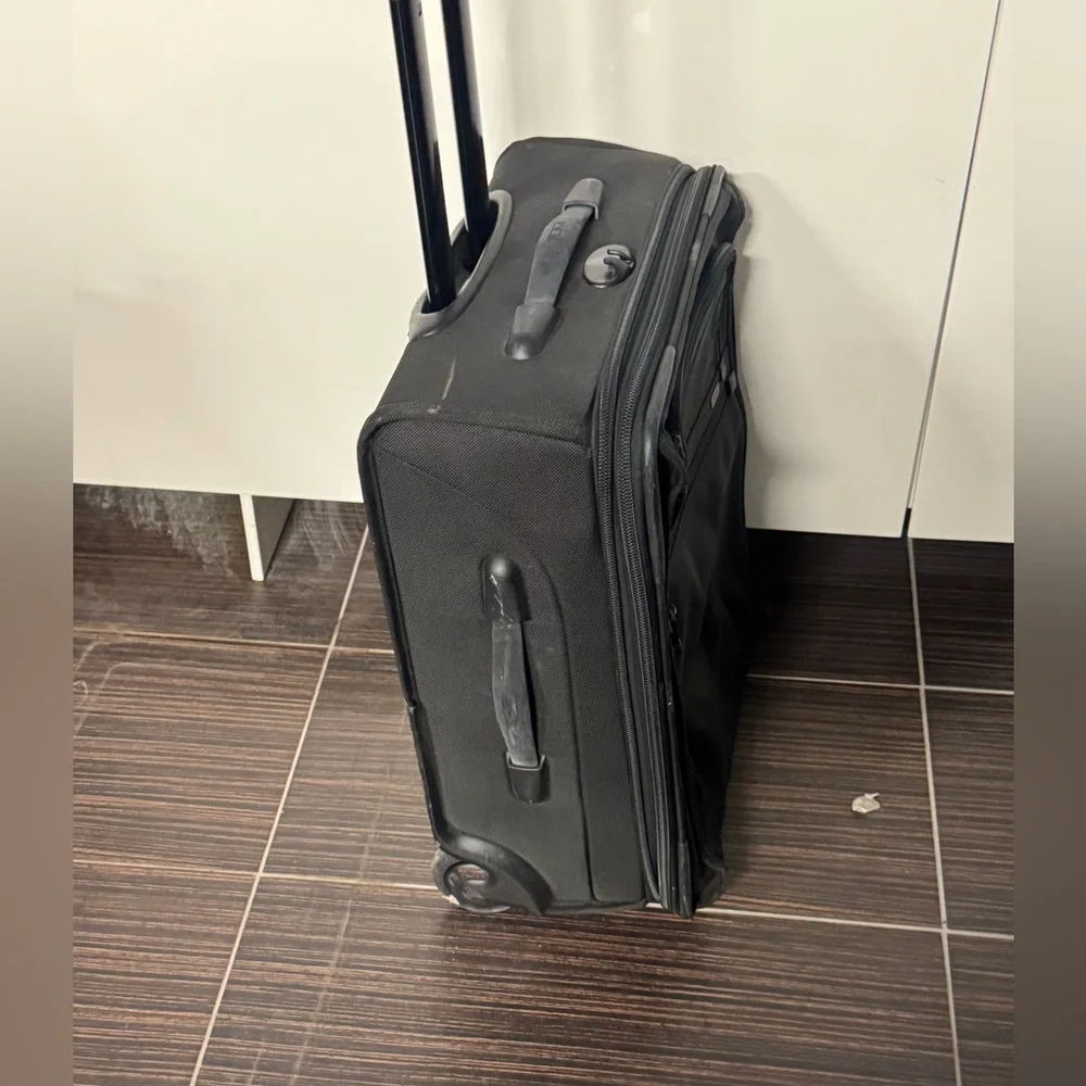 Tumi Black Rolling Carry-On Travel Bag